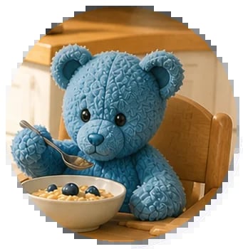 Blue stuffed teddy bear sitting in a wooden chair holding a bowl of cereal with berries